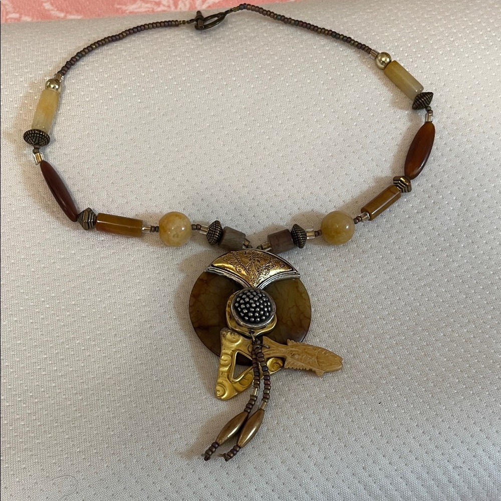 Artistic Beaded Necklace with Gold and Brown Accents